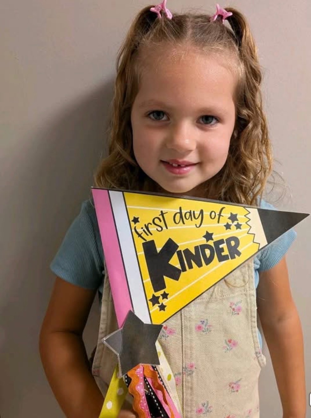 Child celebrating the first day of kindergarten